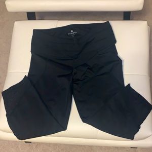 Athleta Black Crops with sheer cut outs